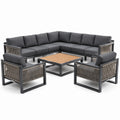 Set da salotto angolare in alluminio con tavolino in teak e cuscini in poliestere grigio