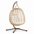 Sedia sospesa in rattan con cuscino beige e base in metallo 195cm
